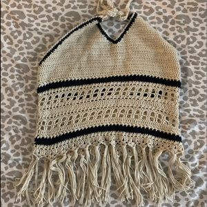 a cute white and black crop top, size medium and worn a few times